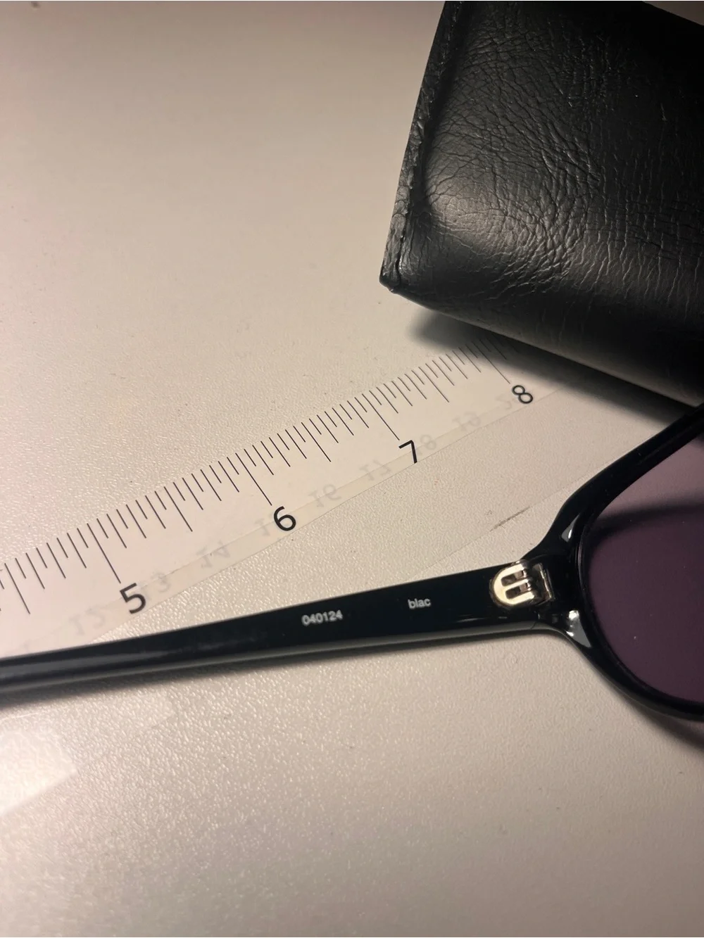 Stussy Black Frame Sunglasses with Purple Tinted Lenses